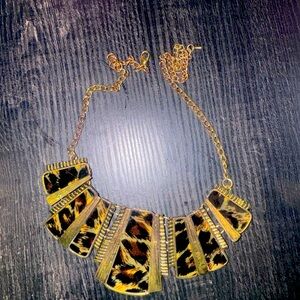 Leopard print necklace.